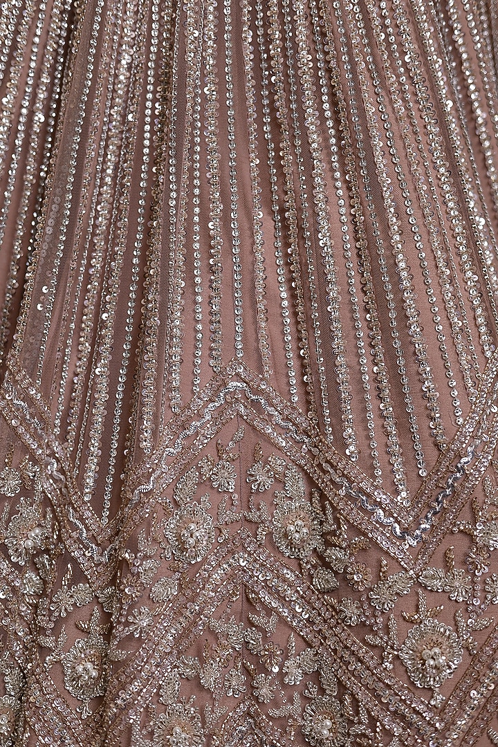Biscoff Pink Net Sequins & Cutdana Embroidered Bridal Lehenga Set by Isa by Dolly Wahal at Pernia's Pop Up Shop