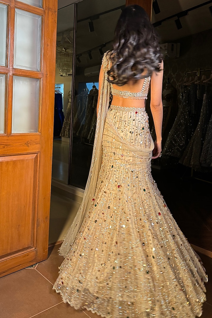 Ivory Net Sequins Embroidered Pre-Draped Bridal Saree Set by Isa by Dolly Wahal at Pernia's Pop Up Shop