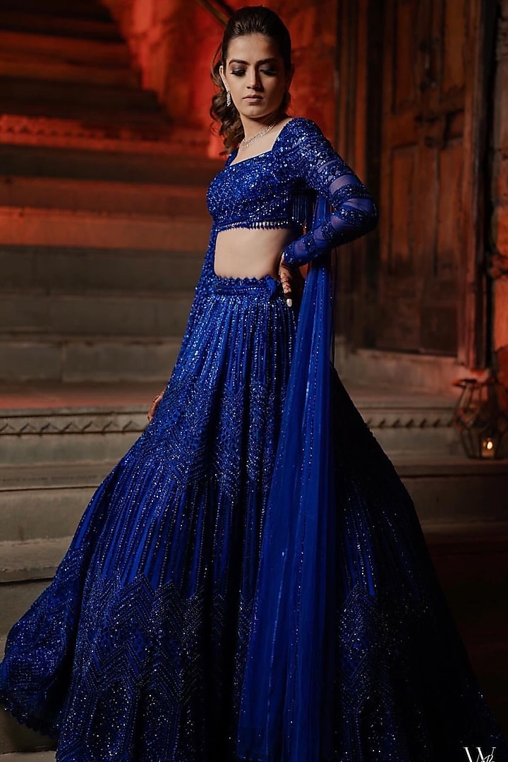 Blue Net Crystal & Cutdana Embroidered Bridal Lehenga Set by Isa by Dolly Wahal at Pernia's Pop Up Shop