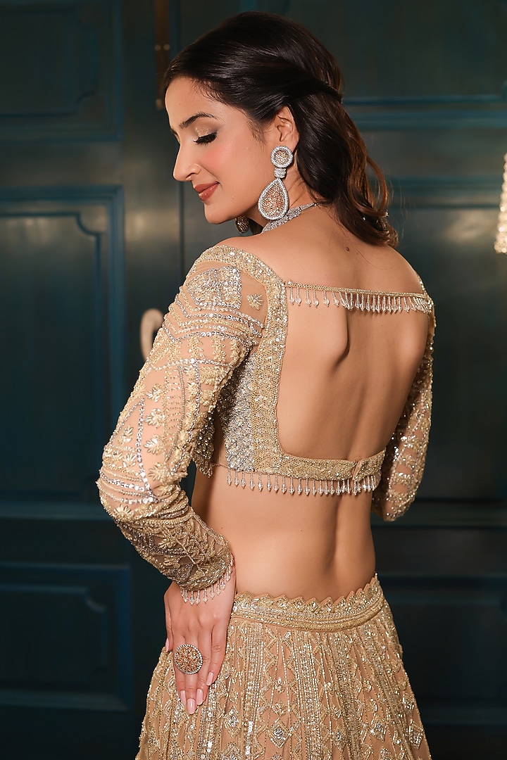 Light Gold Net Sequins Embroidered Bridal Lehenga Set by Isa by Dolly Wahal at Pernia's Pop Up Shop