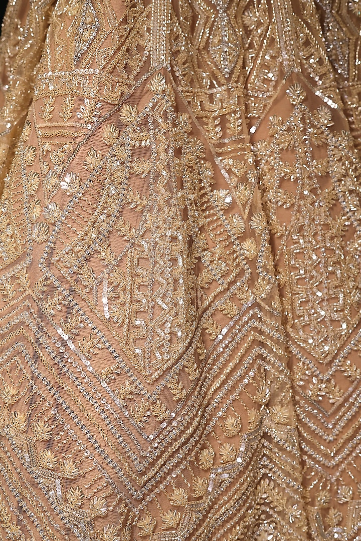 Light Gold Net Sequins Embroidered Bridal Lehenga Set by Isa by Dolly Wahal at Pernia's Pop Up Shop