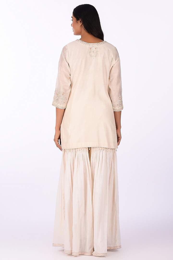 Ivory Raw Crushed Cotton Silk Party Wear Sharara Set by Isha & Anshul at Pernia's Pop Up Shop