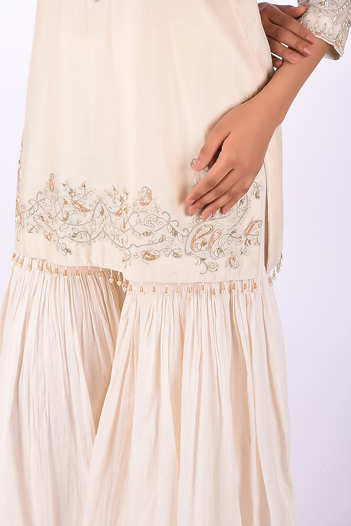 Ivory Raw Crushed Cotton Silk Party Wear Sharara Set by Isha & Anshul at Pernia's Pop Up Shop