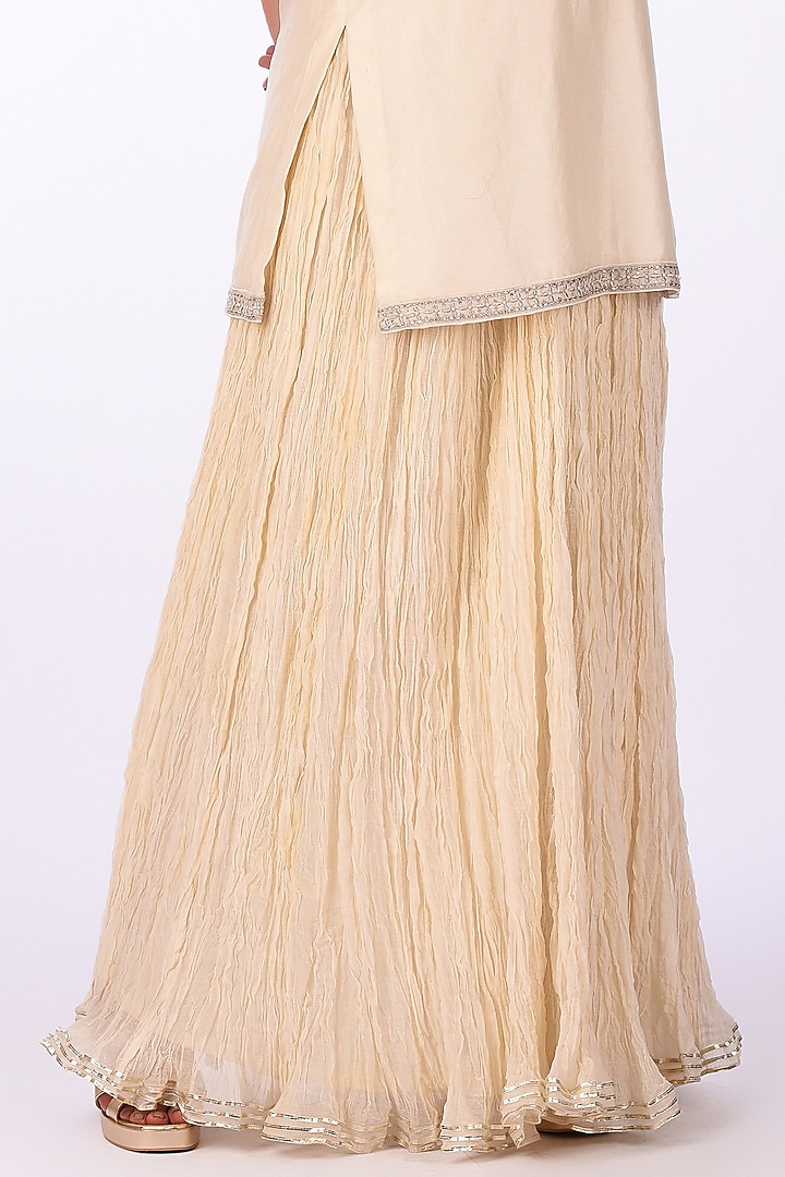 Ivory Raw Crushed Cotton Silk Party Wear Sharara Set by Isha & Anshul at Pernia's Pop Up Shop