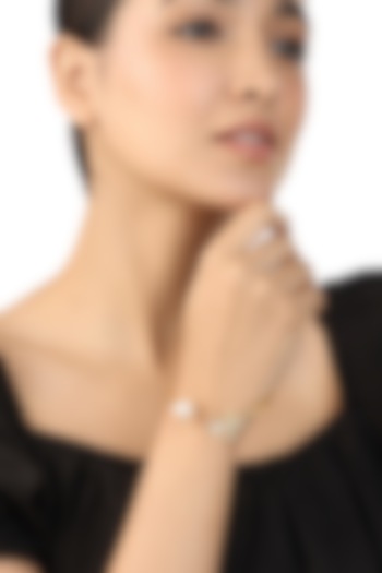 Gold Plated Floral Mirror & Pearl Cuff Bracelet by Isharya at Pernia's Pop Up Shop