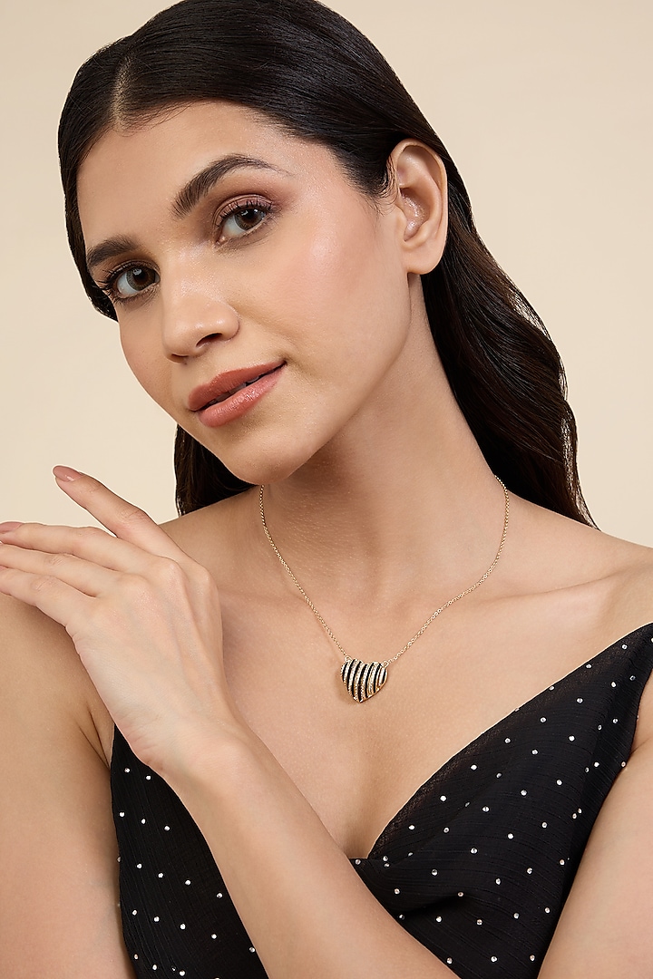 Gold Plated CZ Stone Black Enameled Heartbeat Pendant Necklace by Isharya at Pernia's Pop Up Shop