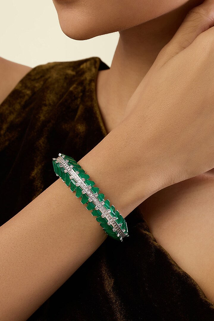White Rhodium Finish Crystal Zirconia & Emerald Stone Cuff Bracelet by Isharya at Pernia's Pop Up Shop