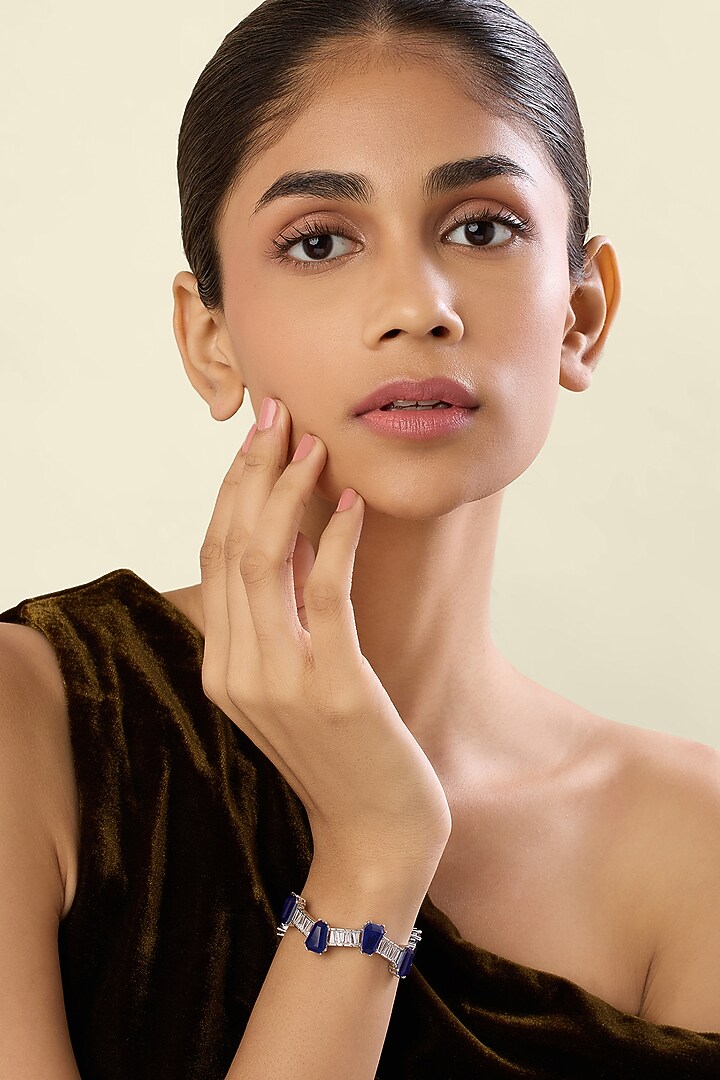 White Rhodium Finish Crystal Zirconia & Blue Stone Cuff Bracelet by Isharya at Pernia's Pop Up Shop