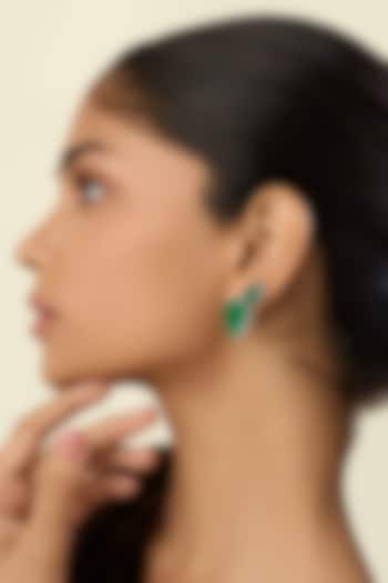 White Rhodium Finish Green Stone Stud Earrings by Isharya at Pernia's Pop Up Shop