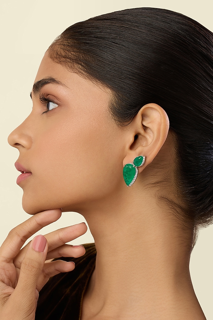 White Rhodium Finish Green Stone Stud Earrings by Isharya at Pernia's Pop Up Shop