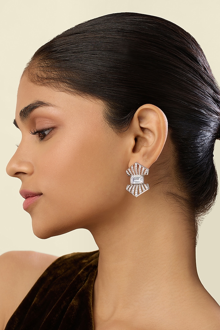 White Rhodium Finish Crystal Zirconia Stud Earrings by Isharya at Pernia's Pop Up Shop