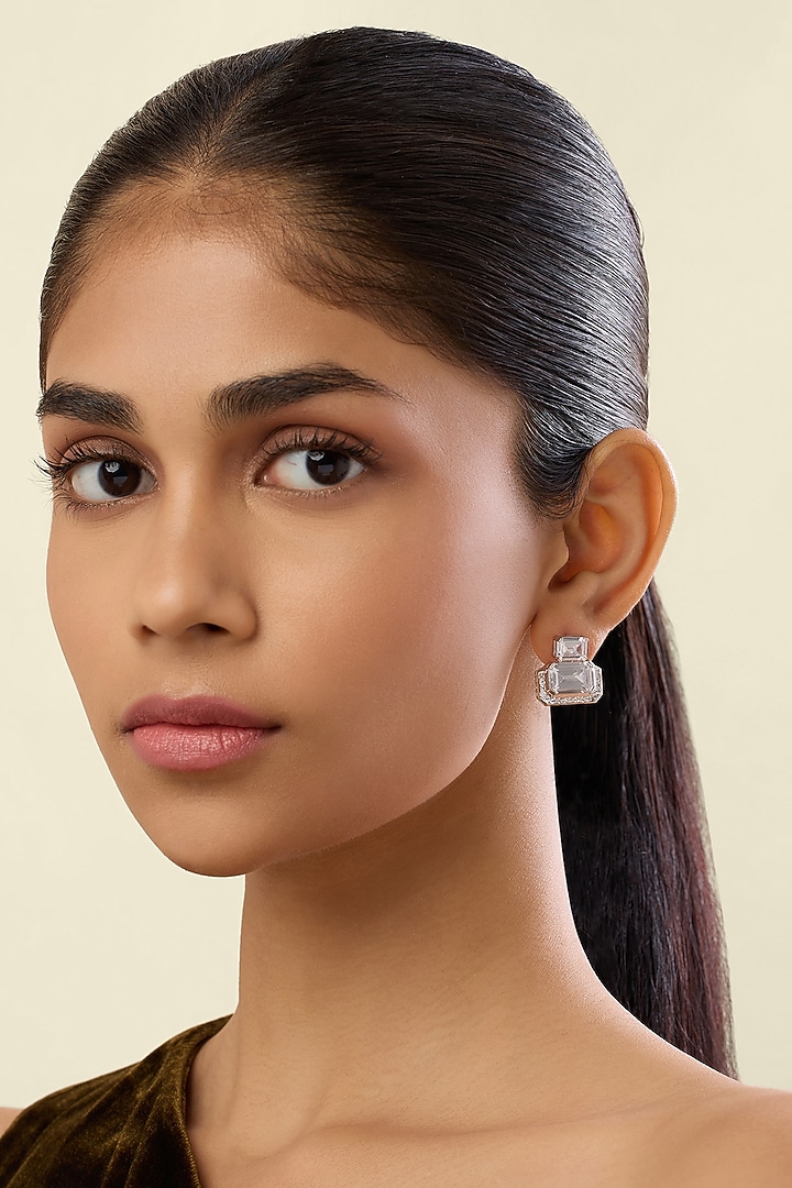 White Rhodium Finish Crystal Zirconia Stud Earrings by Isharya at Pernia's Pop Up Shop