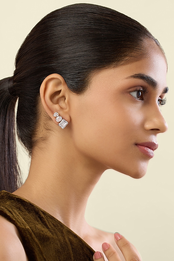 White Rhodium Finish Crystal Zirconia Stud Earrings by Isharya at Pernia's Pop Up Shop