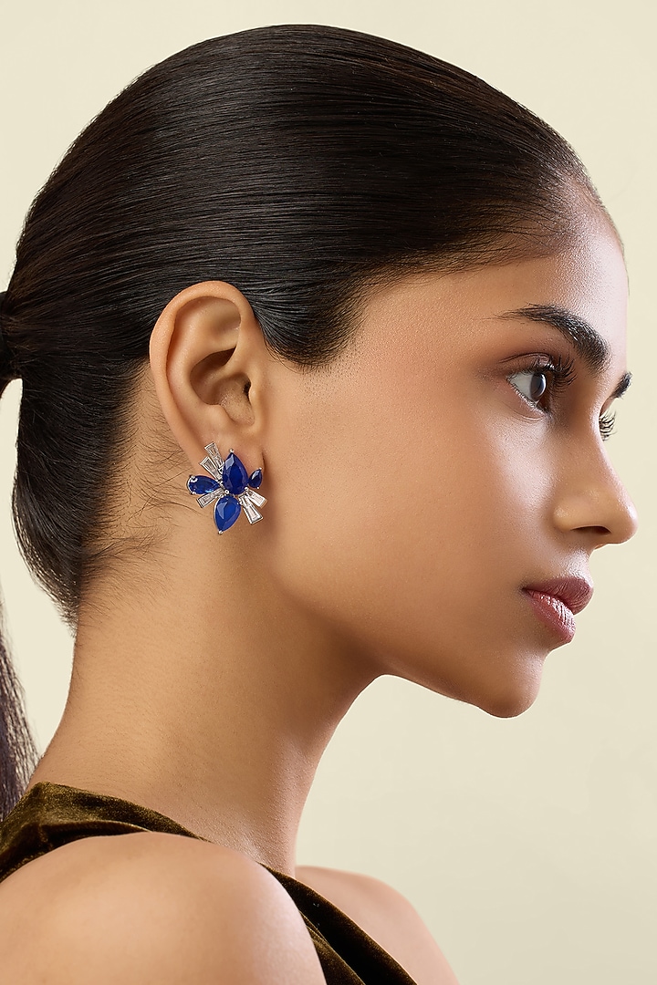 White Rhodium Finish Crystal Zirconia & Sapphire Stone Stud Earrings by Isharya at Pernia's Pop Up Shop