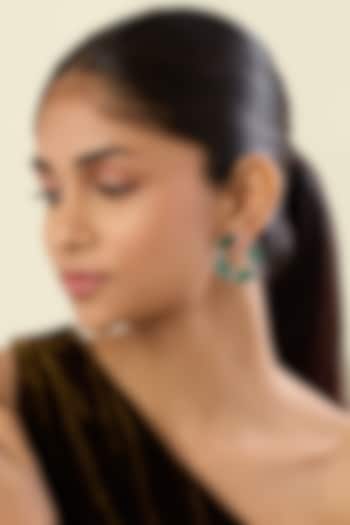 White Rhodium Finish Crystal Zirconia & Green Stone Hoop Earrings by Isharya at Pernia's Pop Up Shop