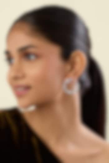 White Rhodium Finish Crystal Zirconia Hoop Earrings by Isharya at Pernia's Pop Up Shop