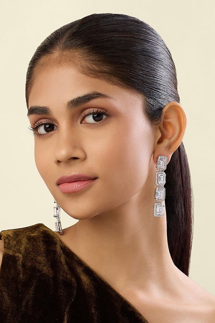 White Rhodium Finish Crystal Zirconia Dangler Earrings by Isharya at Pernia's Pop Up Shop