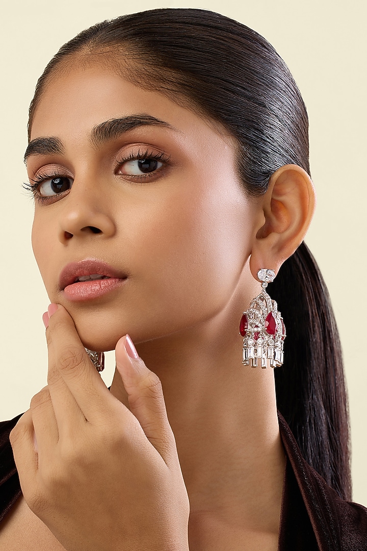 White Rhodium Finish Crystal Zirconia & Ruby Stone Dangler Earrings by Isharya at Pernia's Pop Up Shop