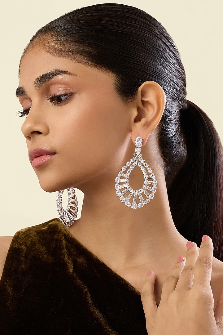 White Rhodium Finish Crystal Zirconia Dangler Earrings by Isharya at Pernia's Pop Up Shop