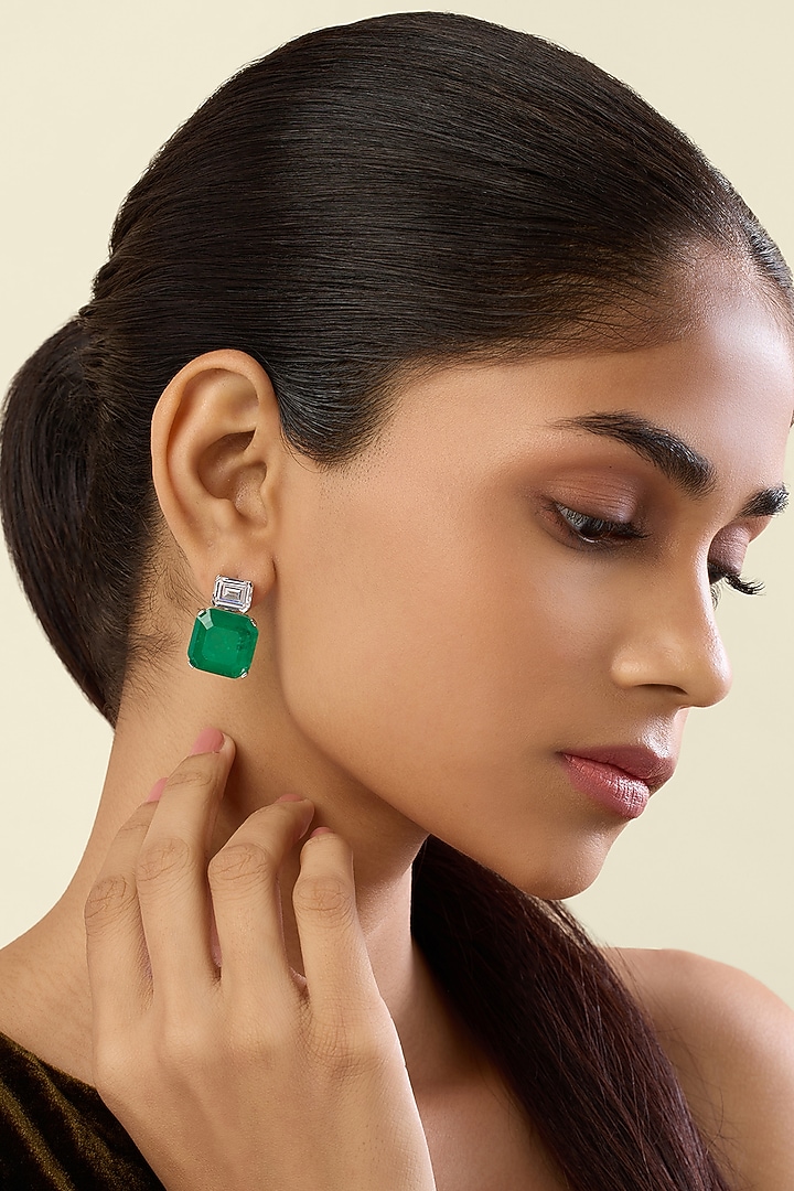 White Rhodium Finish Crystal Zirconia & Emerald Stone Stud Earrings by Isharya at Pernia's Pop Up Shop