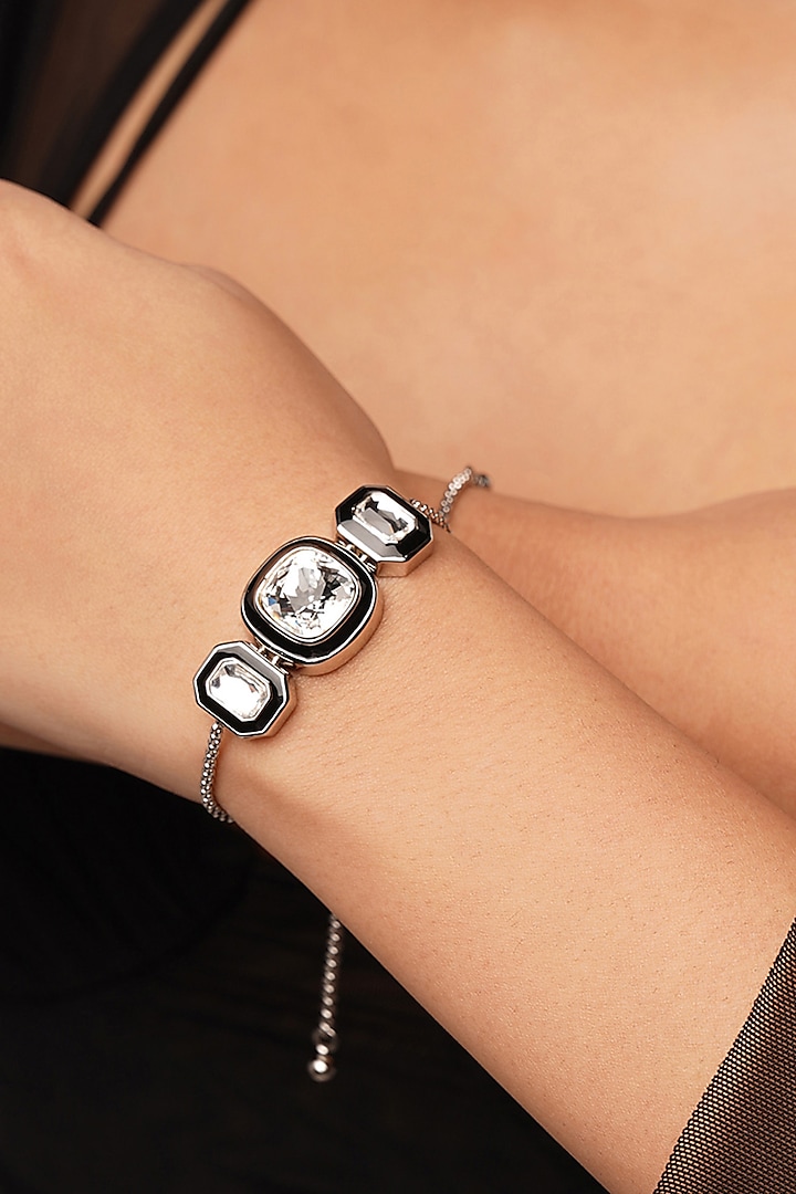 Black Rhodium Finish White Crystal Bezel Bracelet by Isharya at Pernia's Pop Up Shop