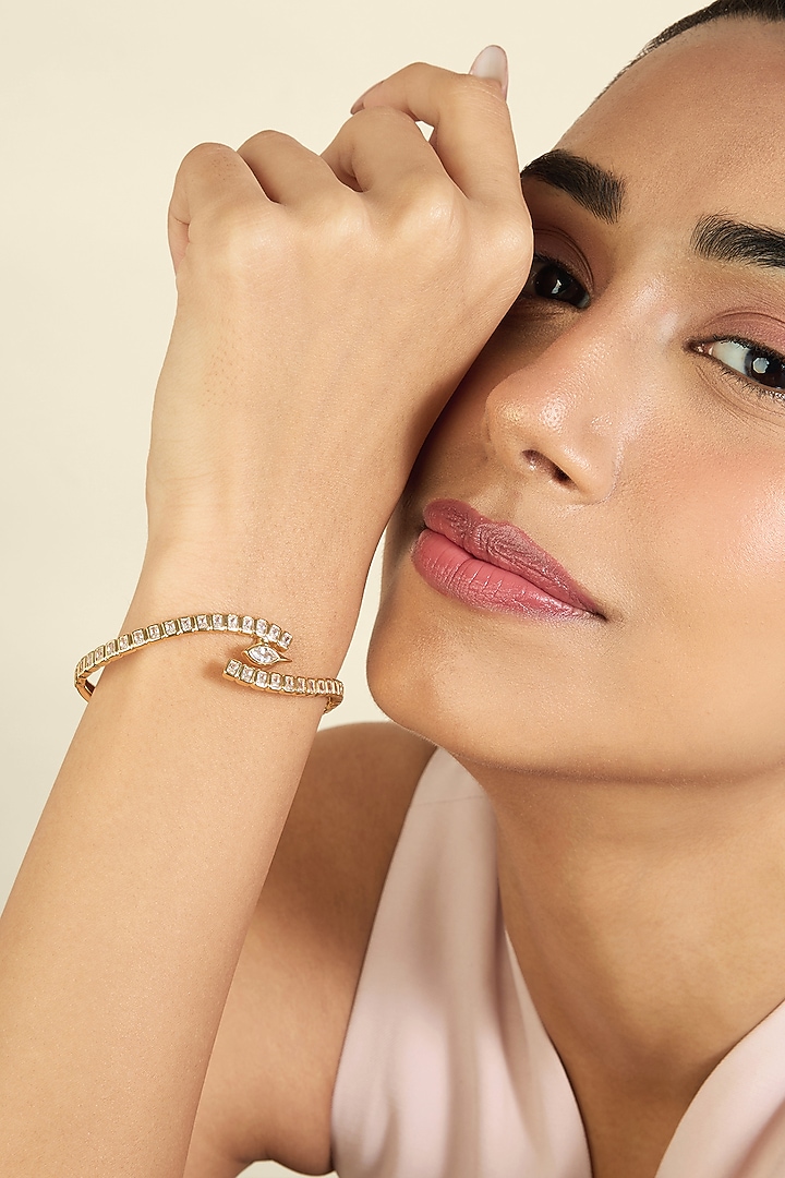 Gold Plated Mirror Swirl Cuff by Isharya at Pernia's Pop Up Shop
