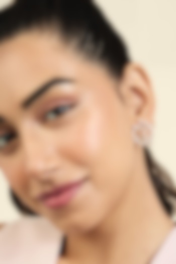 Gold Plated Mirror Tennis Spiral Stud Earrings by Isharya at Pernia's Pop Up Shop