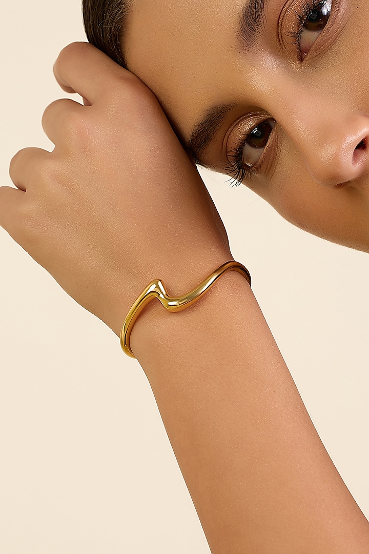 Gold Plated Synthetic Stone Slither Wave Cuff by Isharya