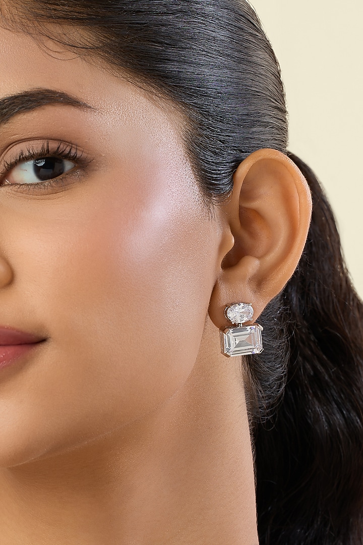 White Rhodium Finish White Synthetic Stone Stud Earrings by Isharya at Pernia's Pop Up Shop