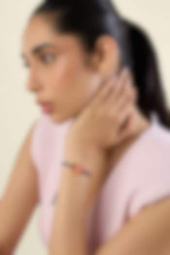 Gold Plated Crystal Zirconia & Hanuman Motif Orange Enameled Bracelet by Isharya at Pernia's Pop Up Shop