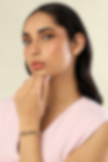 Gold Plated Pink & Green Crystal Zirconia Black Enameled Cuffs (Set Of 2) by Isharya at Pernia's Pop Up Shop