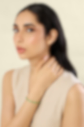 Gold Plated Crystal Zirconia & Evil-eye Motif Green Enameled Cuff by Isharya at Pernia's Pop Up Shop