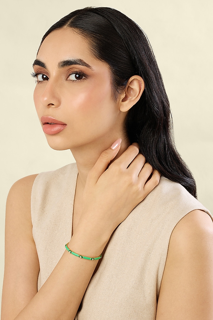 Gold Plated Crystal Zirconia & Evil-eye Motif Green Enameled Cuff by Isharya at Pernia's Pop Up Shop