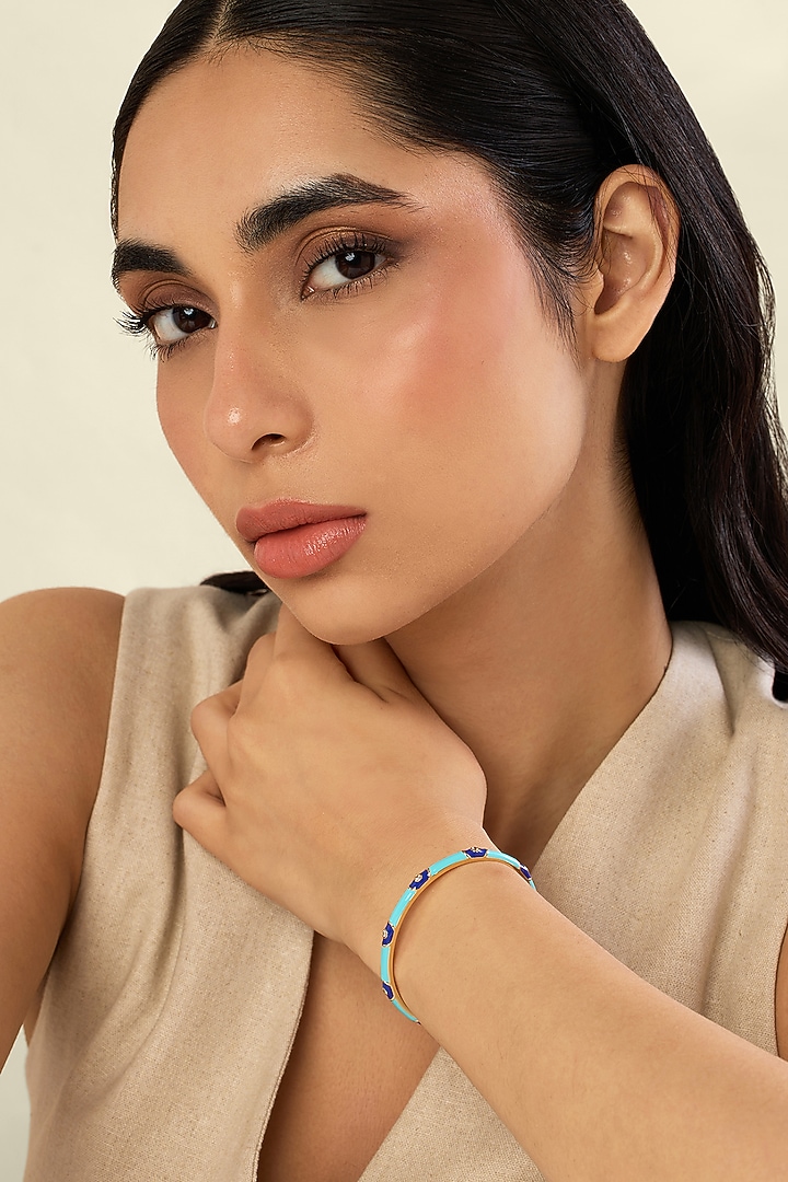 Gold Plated Crystal Zirconia & Evil-eye Motif Blue Enameled Cuff by Isharya at Pernia's Pop Up Shop