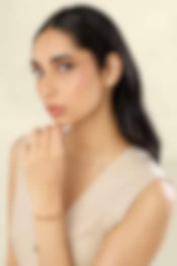 Gold Plated Orange Baguette-Cut Crystal Zirconia Cuff by Isharya at Pernia's Pop Up Shop