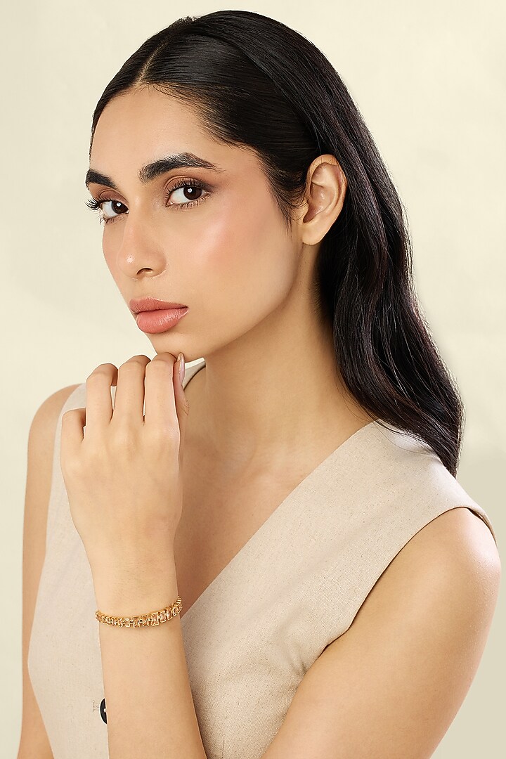 Gold Plated Orange Baguette-Cut Crystal Zirconia Cuff by Isharya at Pernia's Pop Up Shop