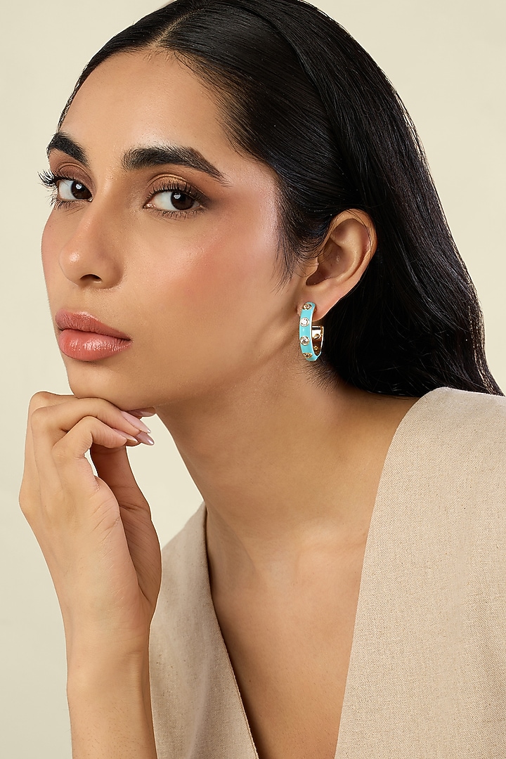 Gold Plated Crystal Zirconia Turquoise Enameled Huggie Earrings by Isharya at Pernia's Pop Up Shop