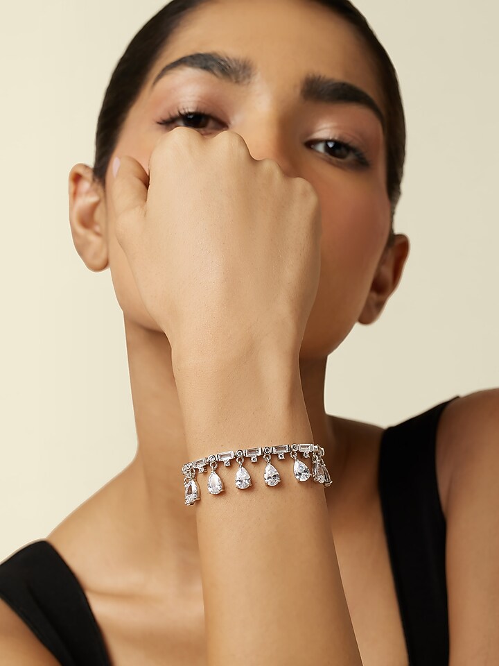 White Rhodium Finish Crystal Zircon Charm Bracelet by Isharya at Pernia's Pop Up Shop