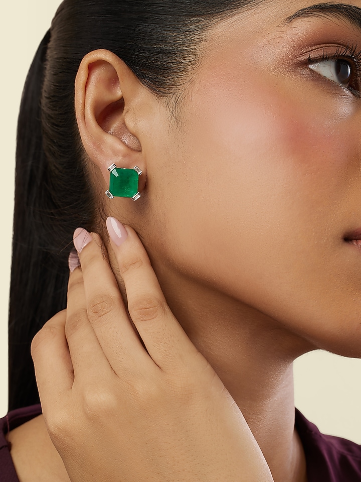 White Rhodium Finish Crystal Zircon & Emerald Green Doublet Stone Square Stud Earrings by Isharya at Pernia's Pop Up Shop