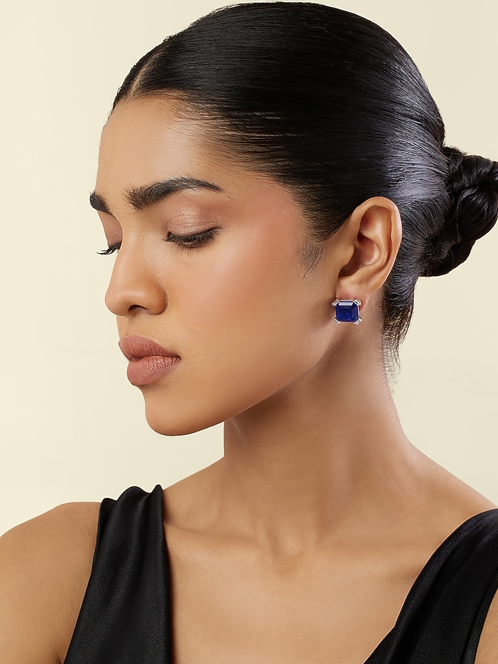 White Rhodium Finish Crystal Zircon & Sapphire Doublet Stone Square Stud Earrings by Isharya at Pernia's Pop Up Shop