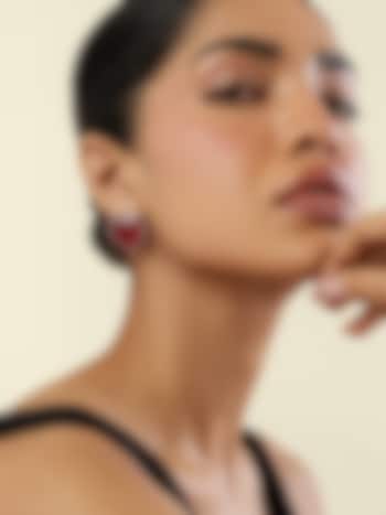 White Rhodium Finish Crystal Zircon & Ruby Doublet Stone Heart Stud Earrings by Isharya at Pernia's Pop Up Shop