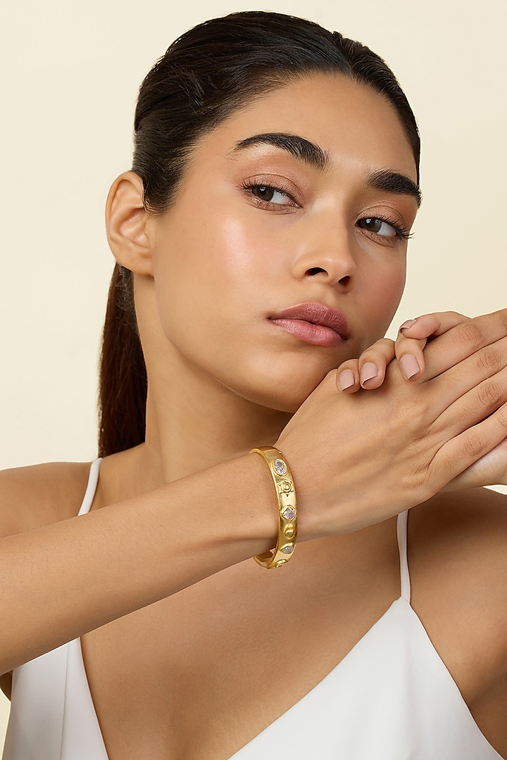 Gold Plated Mirror Oval Hinge Bangle by Isharya at Pernia's Pop Up Shop