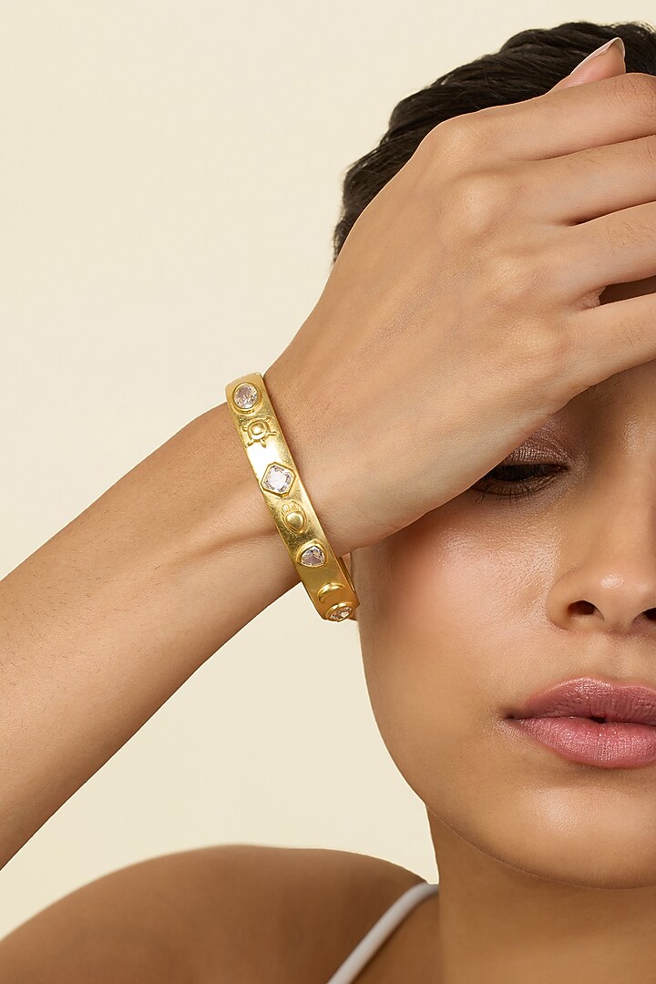 Gold Plated Mirror Oval Hinge Bangle by Isharya at Pernia's Pop Up Shop