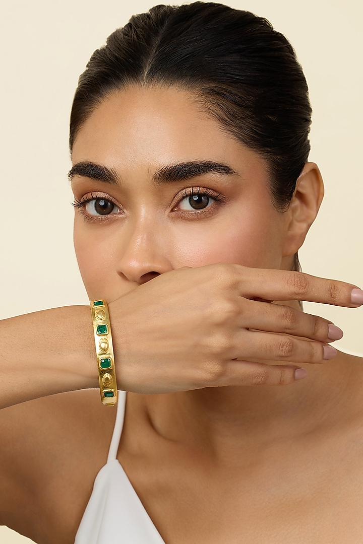 Gold Plated Emerald Oval Hinge Bangle by Isharya at Pernia's Pop Up Shop