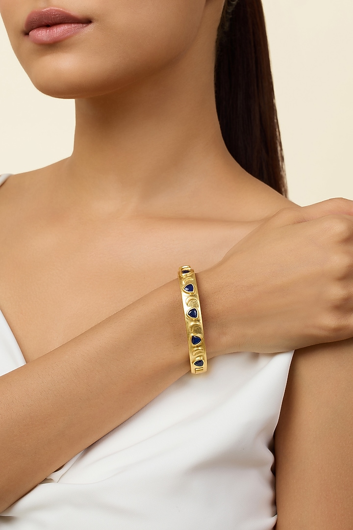 Gold Plated Sapphire Oval Hinge Bangle by Isharya at Pernia's Pop Up Shop