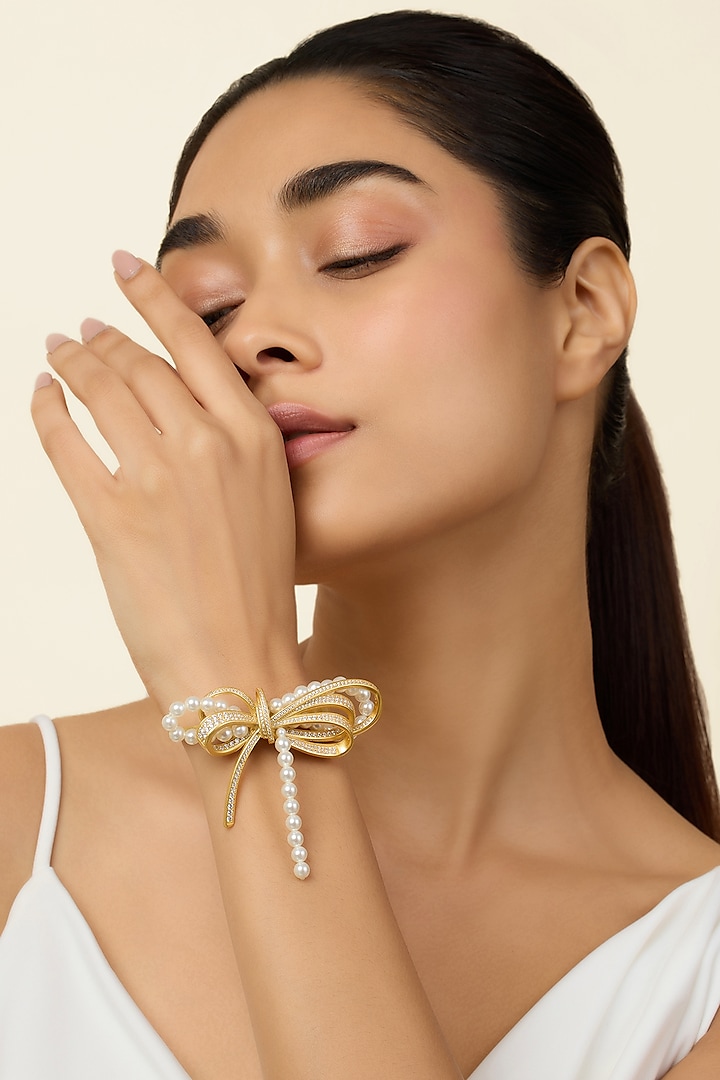 Gold Plated Pearl & CZ Bow Cuff by Isharya at Pernia's Pop Up Shop