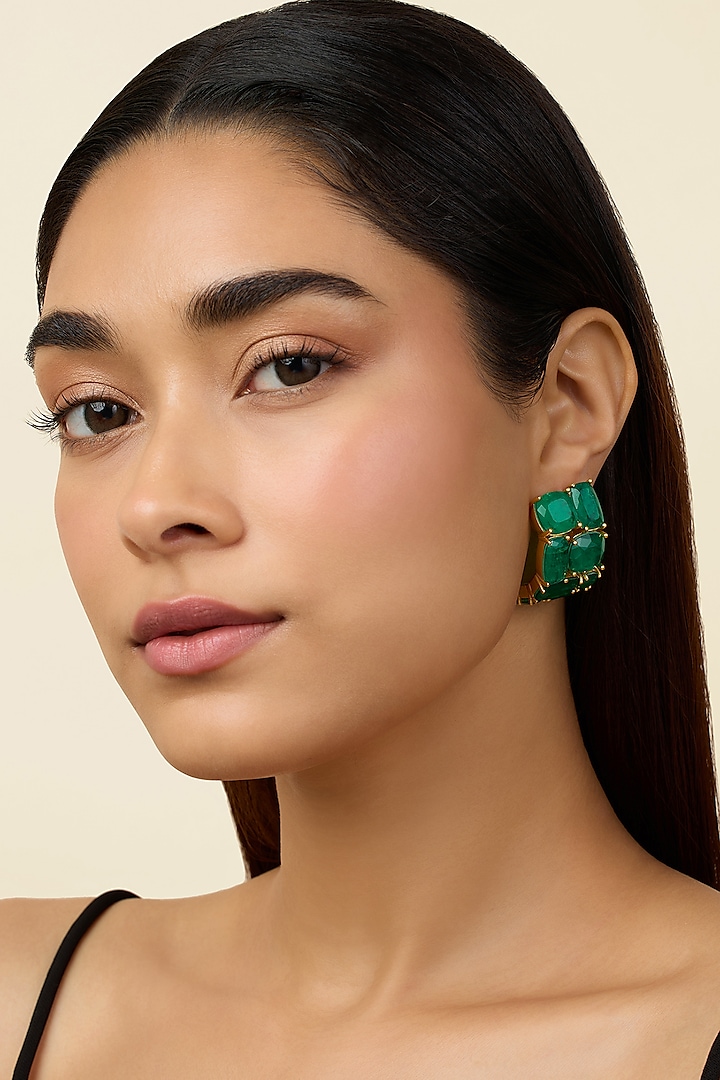 Gold Plated Emerald Synthetic Stone Huggie Hoop Earrings by Isharya at Pernia's Pop Up Shop