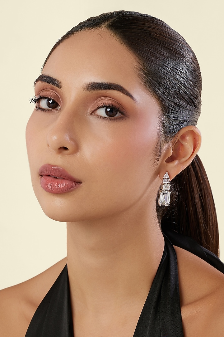 White Rhodium Finish Diamante Dangler Earrings by Isharya at Pernia's Pop Up Shop