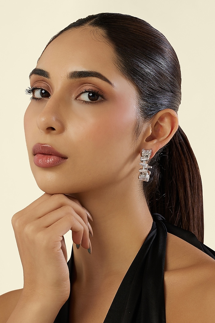 White Rhodium Finish Diamante Hoop Earrings by Isharya at Pernia's Pop Up Shop