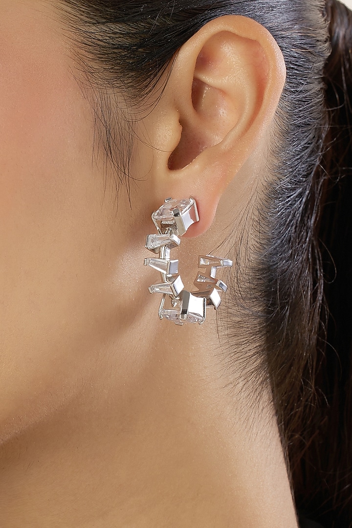 White Rhodium Finish Diamante Hoop Earrings by Isharya at Pernia's Pop Up Shop